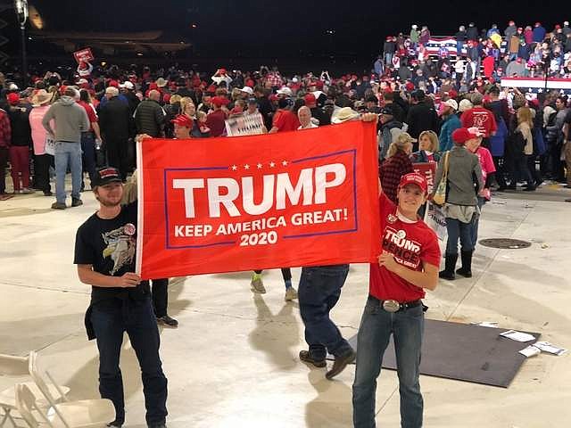 TWO SUPPORTERS of President Donald Trump show their &quot;Keep America Great 2020&quot; banner preceding a Trump speech while campaigning for Montana State Auditor Matt Rosendale, who was running for the U.S. Senate against Sen. Jon Tester. (Erin Jusseaume/Clark Fork Valley Press)