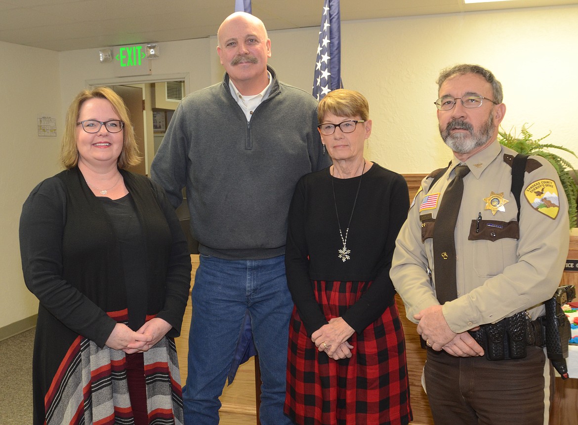 Pictured after taking their oath of office during the Dec. 27 ceremony at the Sanders County Courthouse are, from left, Nichol Scribner, Clerk and Recorder/Treasurer/Superintendent of Schools; Douglas Dryden, Justice of the Peace; Carol Brooker, Commissioner; and Tom Rummel, Sheriff. County Attorney/Public Administrator Naomi Leisz was unable to attend the oath of office ceremony. Commissioner Tony Cox was the county official administering the oath of office to Scribner, Dryden, Brooker and Rummel. (Joe Sova photos/Clark Fork Valley Press)