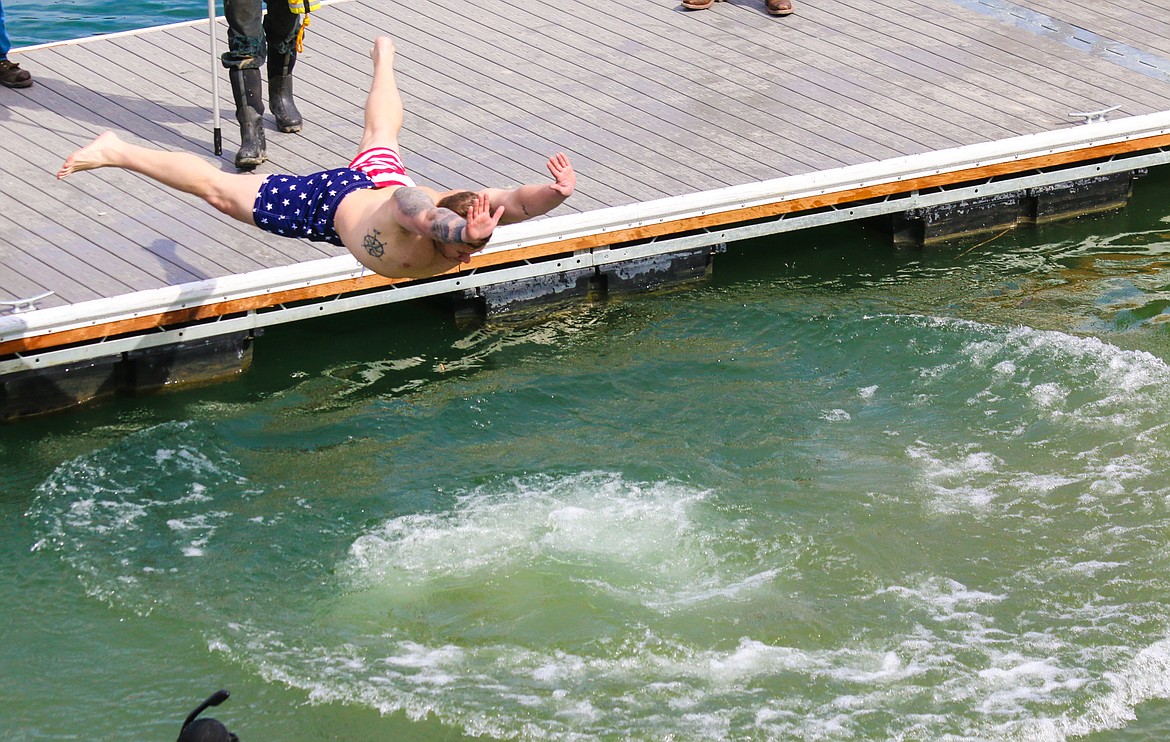 Photo by MANDI BATEMANPeople turned out on St. Patrick&#146;s Day to take the icy plunge into the Kootenai River to help support the Special Olympics.