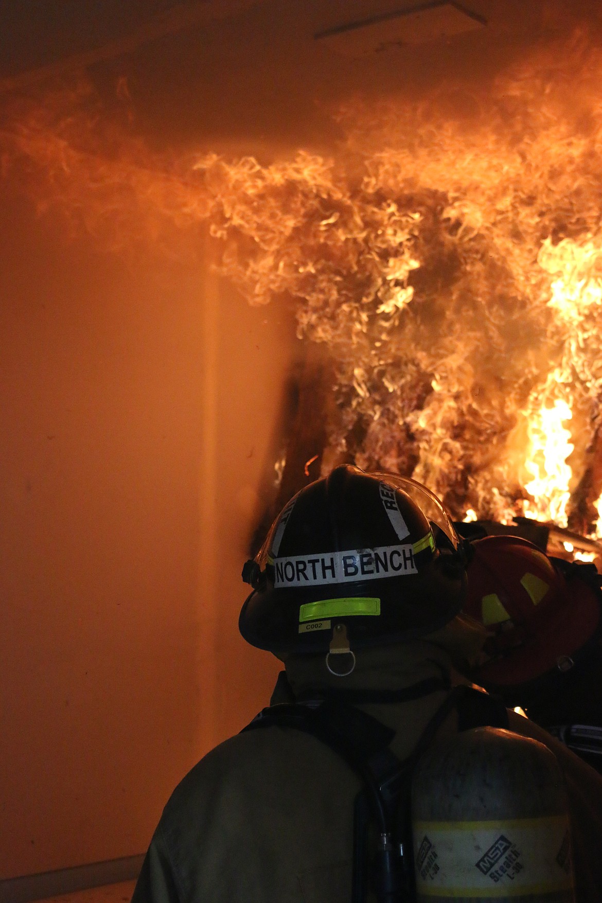 Photo by MANDI BATEMANBoundary County firefighters had the opportunity to train in a live burn on May 19.