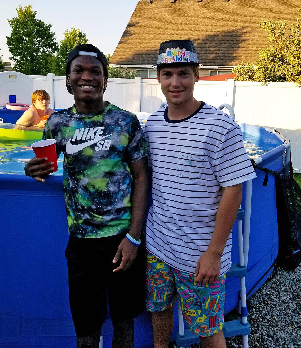 Abdoul Akimana, left, and Carson Noordam, 18, of Coeur d&#146;Alene, are best buddies. They&#146;re seen here in July celebrating Carson&#146;s birthday. (Courtesy photo)