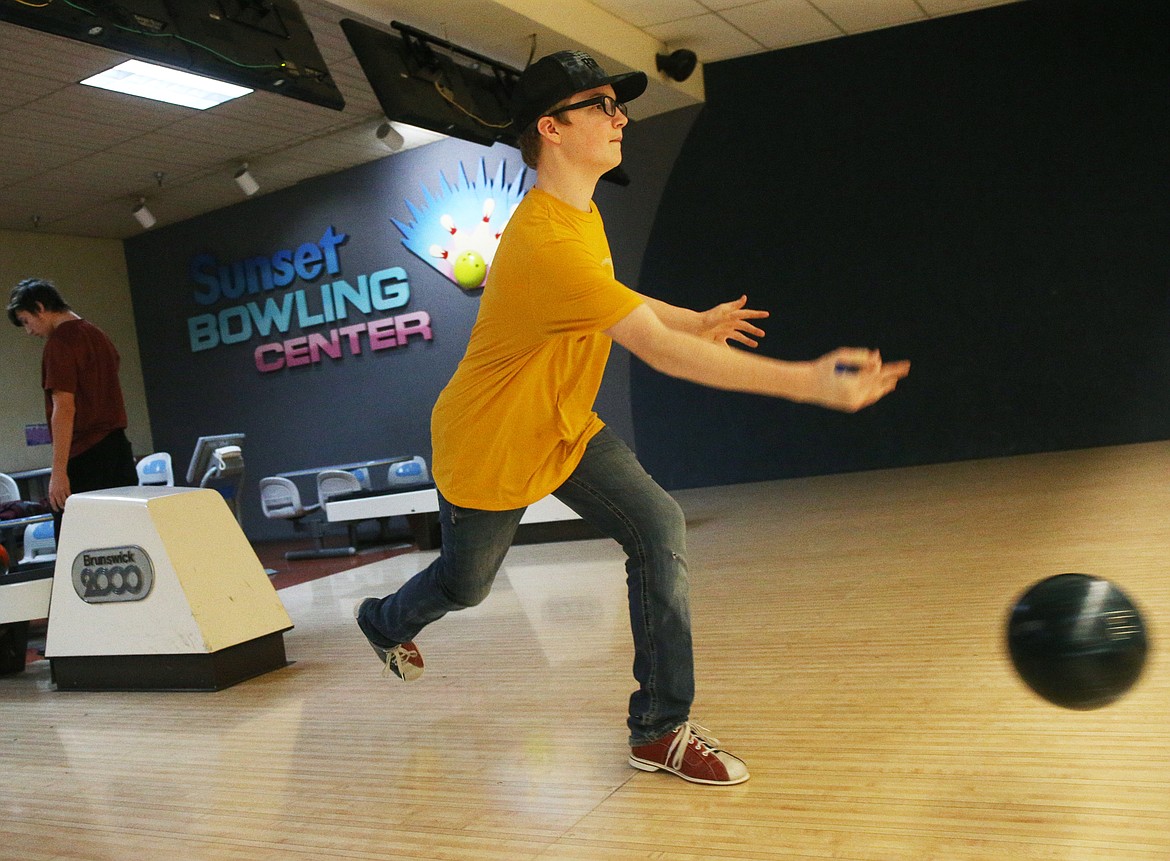 Ryan Morford, 16, bowls with a group of friends Friday evening at Sunset Bowling Center. (LOREN BENOIT/Press)