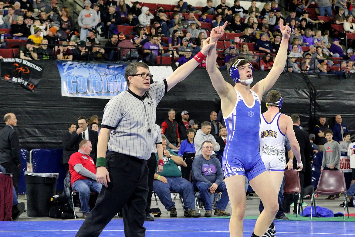 Ben Windauer celebrates after winning the 170-pound Class A state wrestling title. (Bob Windauer photo)