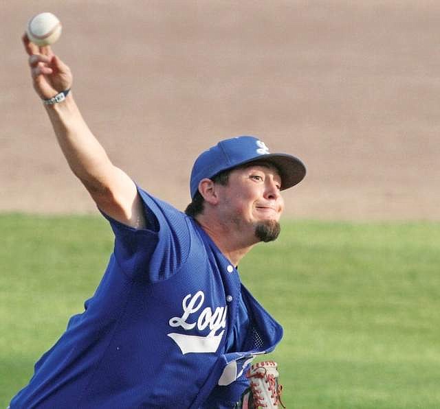 Joe Flores delivers the 0-2 pitch for a strike and the second out, top of the sixth inning vs. Strathmore July 6. (Paul Seivers/The Western News)