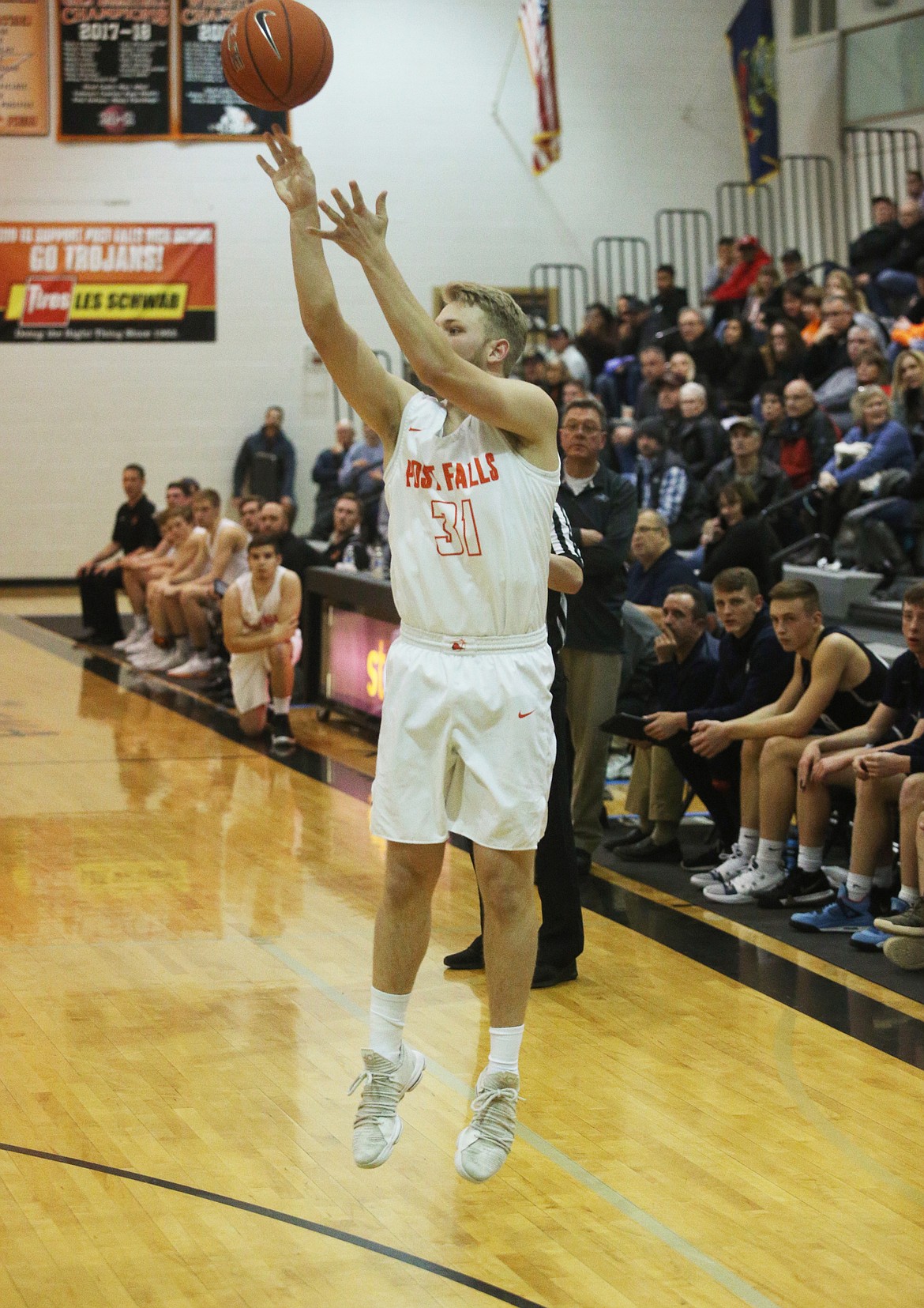 Post Falls guard Jake Rutherford shoots a three pointer in a game against Lake City. (LOREN BENOIT/Press)