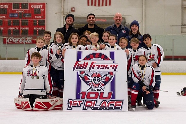 Courtesy photo
The Spokane Junior Chiefs 10 and under youth hockey team, featuring some players and coaches from the Coeur d&#146;Alene area, has been invited to the prestigious Fargo International Squirt Invitational. At the event, the Junior Chiefs will face international teams, as well as teams from Canada and the U.S. The Junior Chiefs, competing under the umbrella of the Spokane Area Youth Hockey Association, has a record of 36-6-1 this season, facing teams from Utah, Oregon, Montana and British Columbia to date. It has been more than 20 years since a Spokane team has been asked to participate in this tournament. The last time Spokane sent a 10U team to Fargo for this event, one of the members of that team was Tysen Azevedo, now 30, and the head coach of the current team. One of the assistant coaches is Lee Nagle of Post Falls, who started coaching three of these boys -- Landon Nagle, David Aggen (Coeur d&#146;Alene) and Matthew Latscha (Coeur d&#146;Alene) -- when they were 5 years old in Coeur d&#146;Alene. The team has started a Facebook page titled Spokane Jr. Chiefs 10U A-1. In the front row from left are Drayson Fields and Alison LeBret; second row from left, Henry Anselmo, David Aggen, Brayden Smith, Will Pattison, Jalon Bryant, Jordyn Miller, Landon Nagle, Matthew Latscha, Caden Stoltz, Gavin Smith, Dayton Popple and Akira Ona; and back row from left, Josh Knight, Tysen Azevedo, Lee Nagle and Paxton Bell.