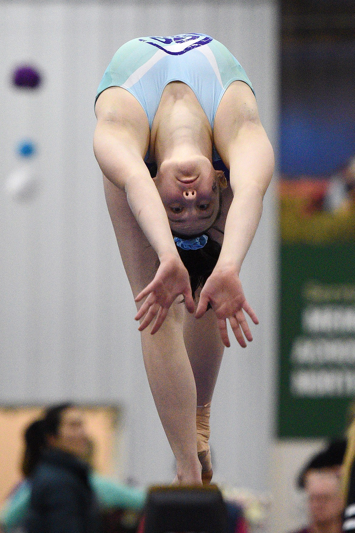 Shalayne Ostler, from Flathead Gymnastics Academy, competes on the balance beam at the 4th annual Glacier Challenge at the Flathead County Fairgrounds Trade Center in Kalispell on Saturday. (Casey Kreider/Daily Inter Lake)