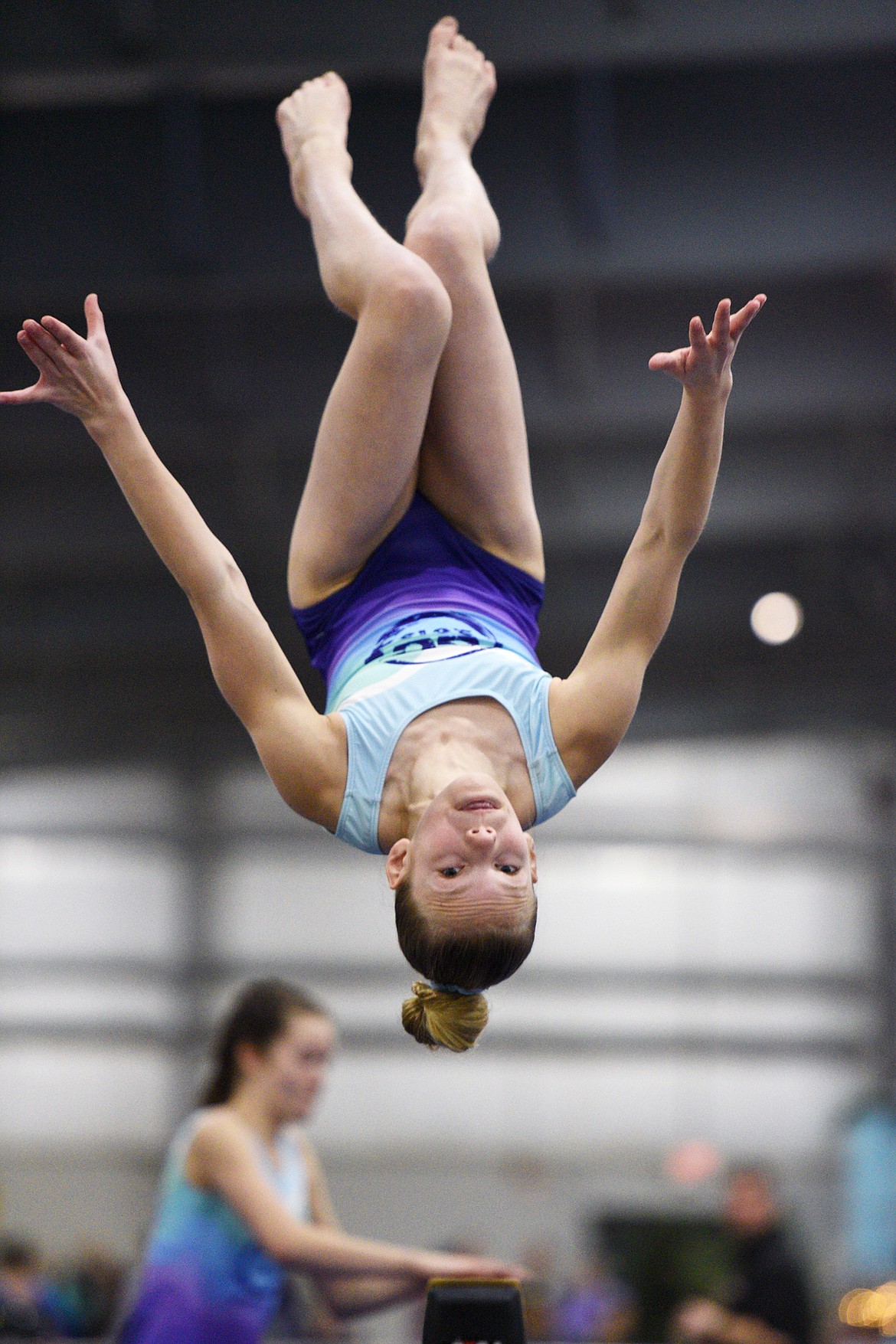 Emma Pate, from Flathead Gymnastics Academy, competes on the balance beam at the 4th annual Glacier Challenge at the Flathead County Fairgrounds Trade Center in Kalispell on Saturday. (Casey Kreider/Daily Inter Lake)