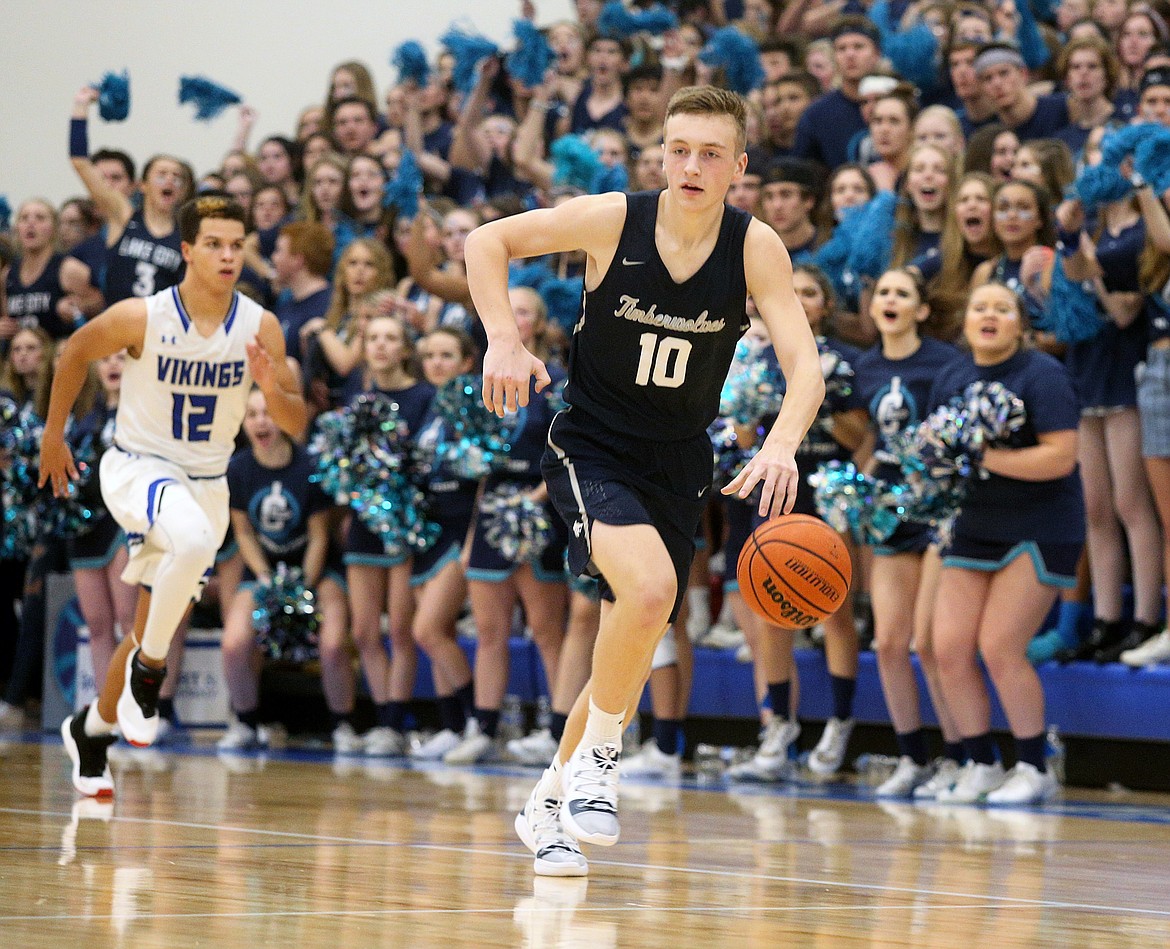 Lake City&#146;s Nathan Spellman dribbles down the court in the first half against Coeur d&#146;Alene in the boys game.