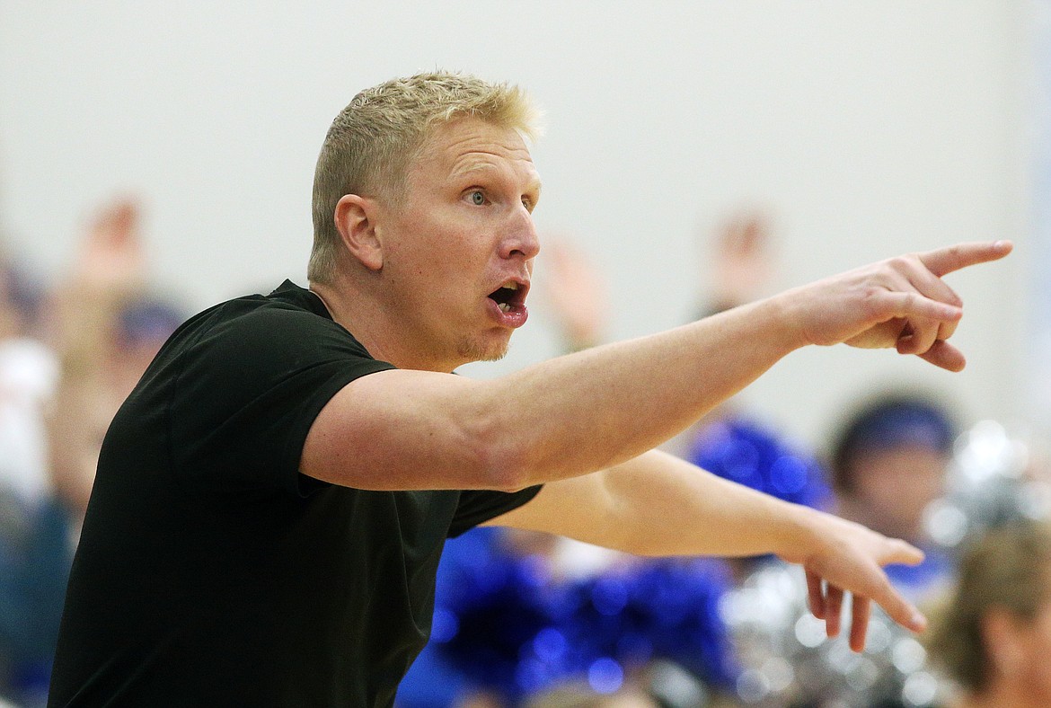 Coeur d&#146;Alene girls head coach Scott Stockwell directs his players during Friday night&#146;s Fight for the Fish.