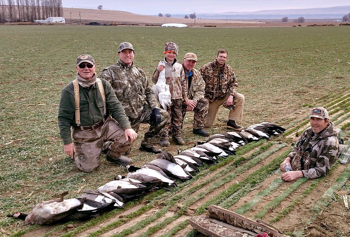 MarDon Resort/courtesy photo
Spud Brown of Royal City, Mike Meseberg of MarDon Resort, and party with the results of a very successful goose hunt. Mason Meseberg is holding his first Snow Goose.