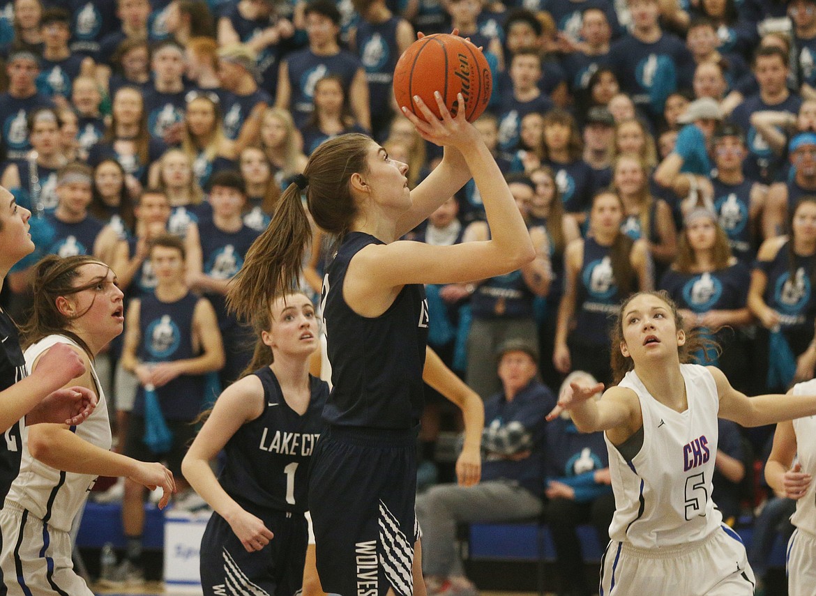 Lake City's Sara Muehlhausen shoots a two pointer against Coeur d'Alene in the first half of Friday night's cross-town spirit rivalry game. (LOREN BENOIT/Press)