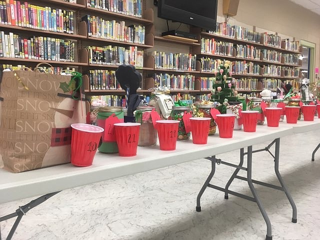 (Courtesy Photo)
The Jolly Jar &#147;auction&#148; was one of BCMS holiday activities.