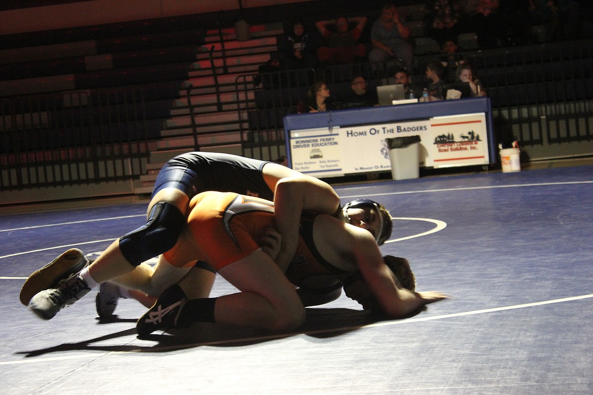 Photo by TANNA YEOUMANS
With the coaches and audience cheering them on, the Badger boys pushed through.