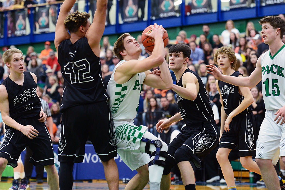 Glacier's Ethan Baines (5) powers to the rim against Flathead during a crosstown matchup at Glacier High School on Friday. (Casey Kreider/Daily Inter Lake)