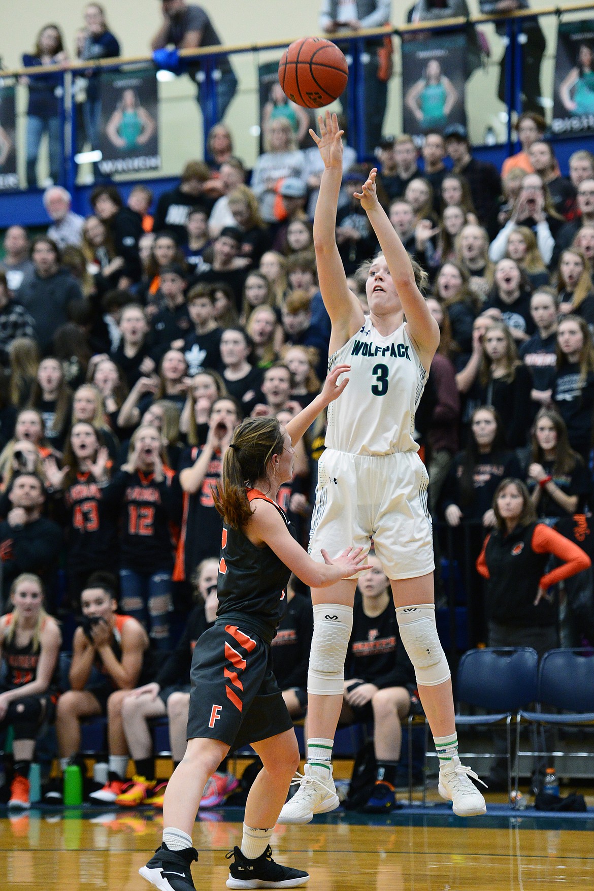 Glacier's Kali Gulick (3) looks to shoot with Flathead's Sadie Wilson (3) defending during a crosstown matchup at Glacier High School on Friday. (Casey Kreider/Daily Inter Lake)