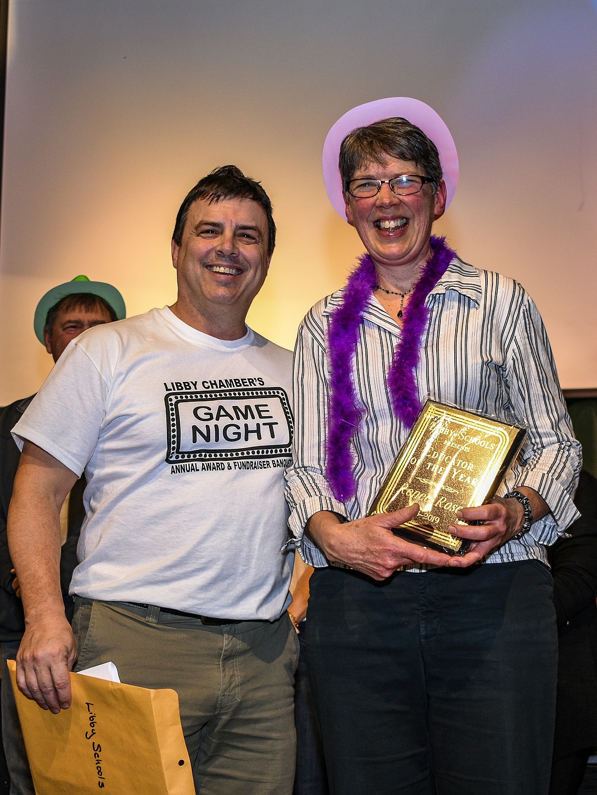 Renee Rose was presented the Libby Schools Educator of the Year award by Superintendent Craig Barringer at the Libby Chamber of Commerce annual fundraiser and awards banquet Friday. (Ben Kibbey/The Western News)