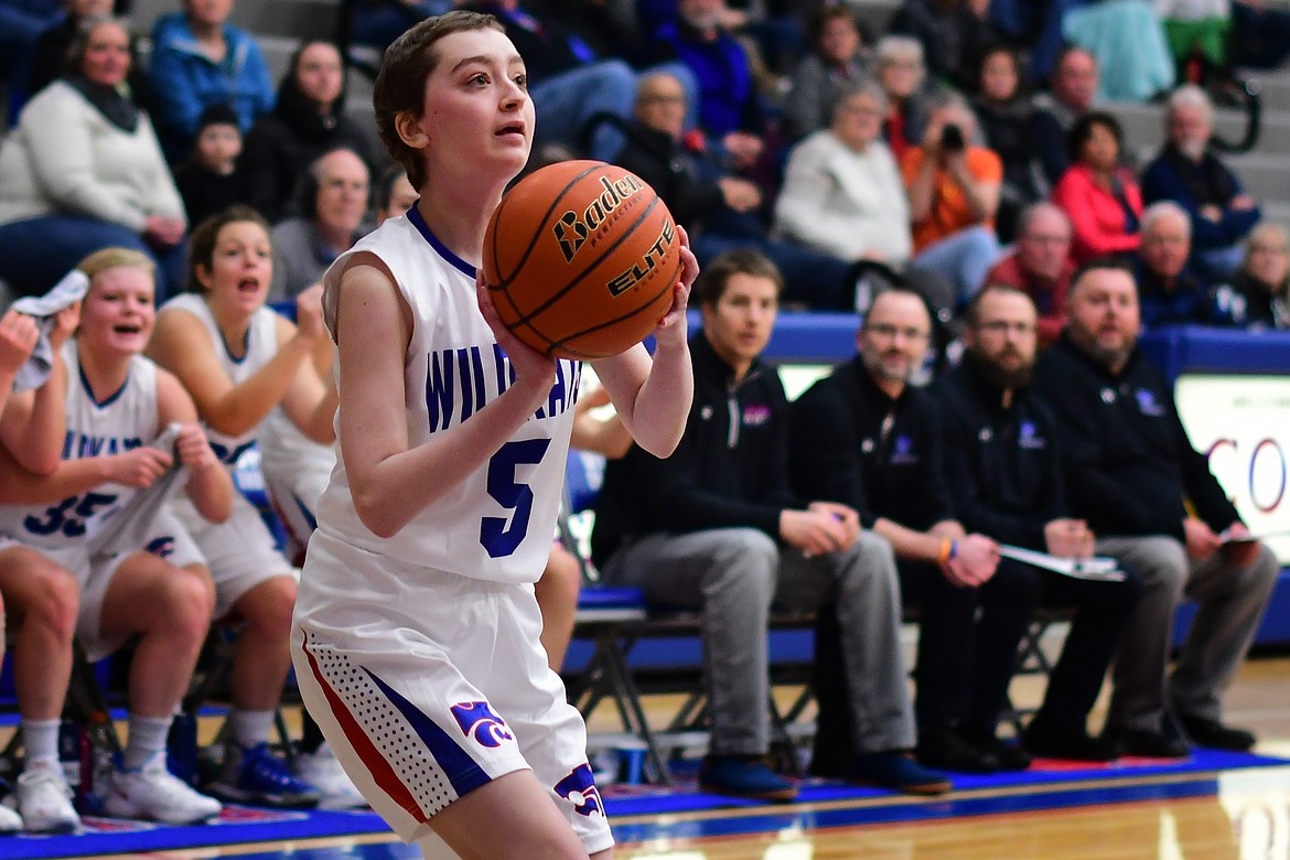 Kimberly Peacock takes a jump shot for the Wildkats in the fourth quarter against Hamilton Saturday. (Jeremy Weber photo)