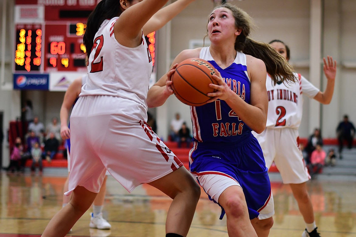 Josie Windauer goes in for a shot against the Lady Indians in Browning Thursday. (Jeremy Weber photo)