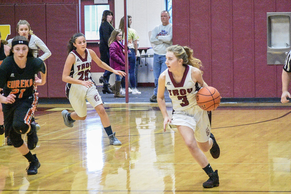 Troy senior Annie Day heads down court during the first quarter against Eureka Saturday. (Ben Kibbey/The Western News)