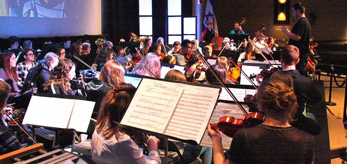 Courtesy photo
The Cd&#146;A Symphony and North Idaho Youth Symphony rehearsing for the January concert.