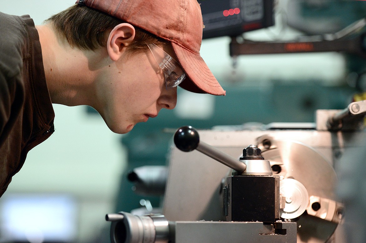 Henry Bachmeier-Bjorge, a sophomore at Flathead High School, works with a ball end cutter on a lathe during Pursuing the Trades at Flathead Valley Community College on Wednesday, Jan. 9. (Casey Kreider/Daily Inter Lake)