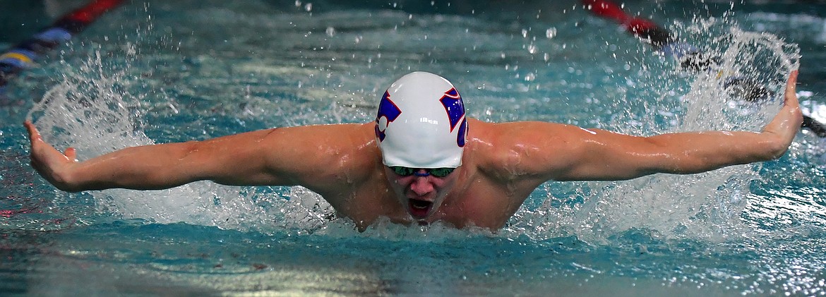 Columbia Falls swimmer Russell Albin qualified for the state meet Saturday after swimming the 100 butterfly in 1:04.25. (Jeremy Weber photo)