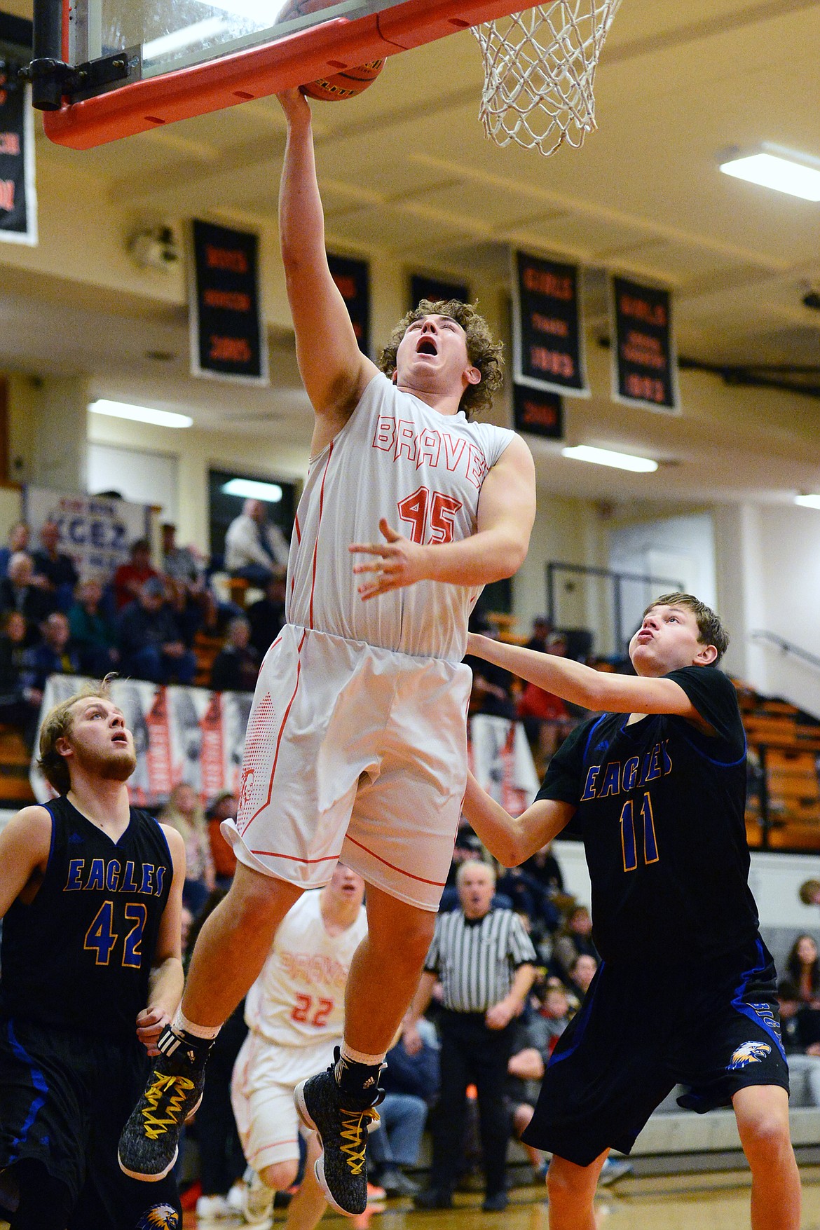 Flathead's Andrew Siderius (45) drives to the basket against Missoula Big Sky at Flathead High School on Thursday. (Casey Kreider/Daily Inter Lake)