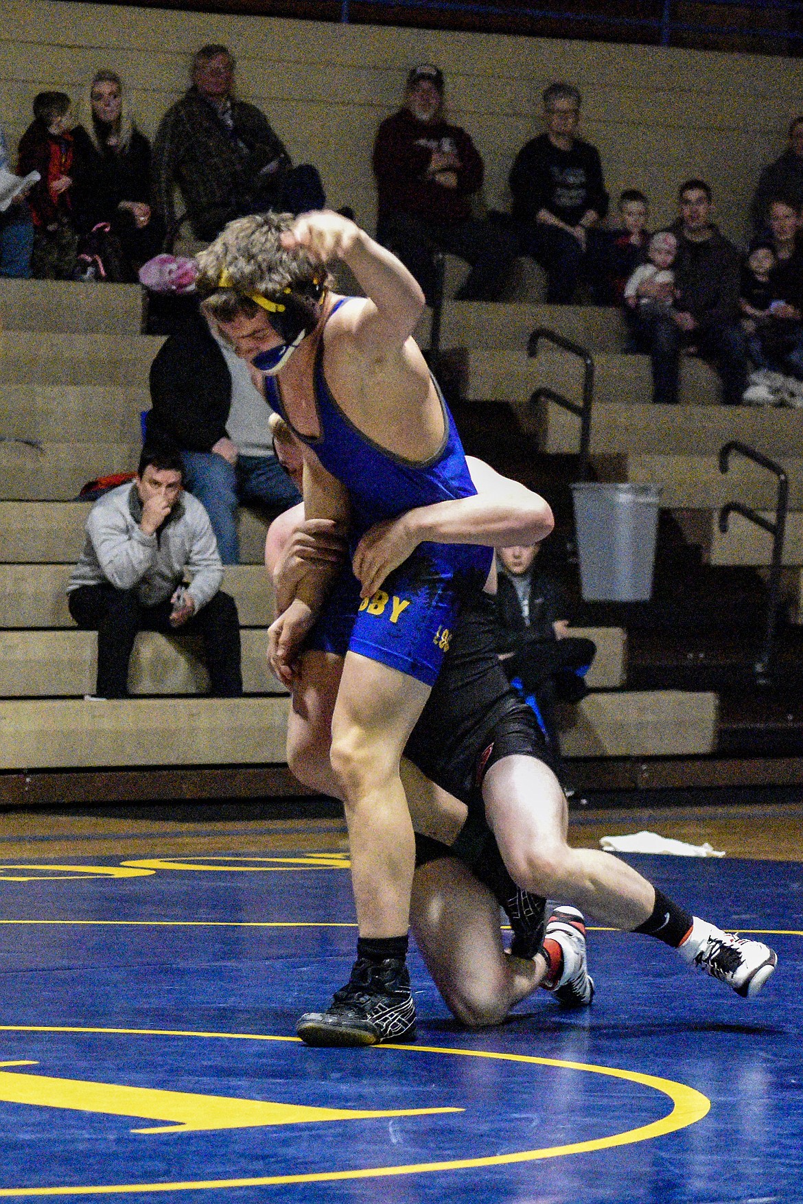 Libby freshman Hunter Hoover gets an escape against Sandpoints&#146; Isaiah Fleck, Jan. 3 in Libby. (Ben Kibbey/The Western News)