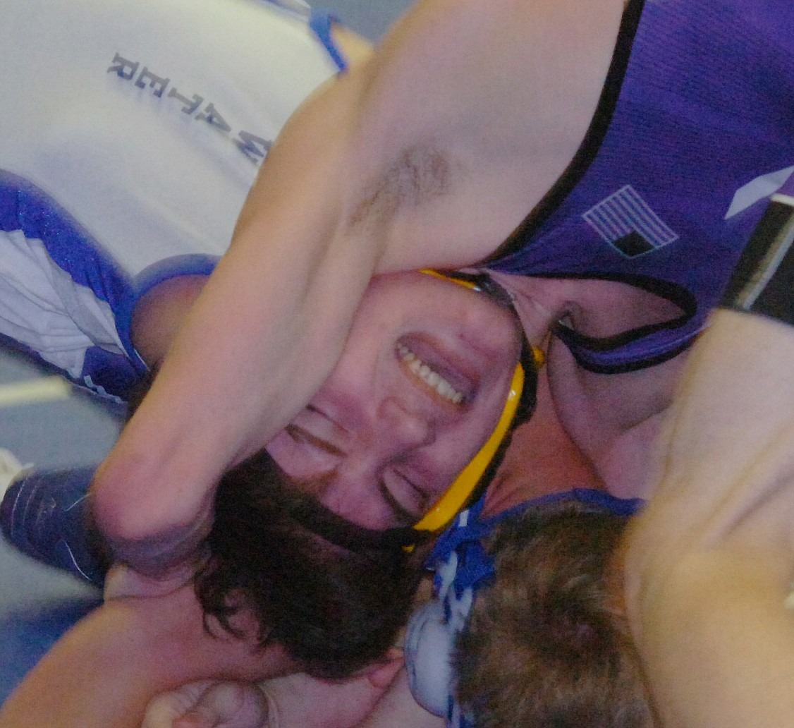 Polson freshman Tyron Stidham works hard against his Broadwater opponent during a Pirate pool dual during the Dave Edginton Western Montana Duals last Friday. Down 11-4, Stidham gave up an escape then got a takedown and quick pin for the win. (Joe Sova/Lake County Leader)