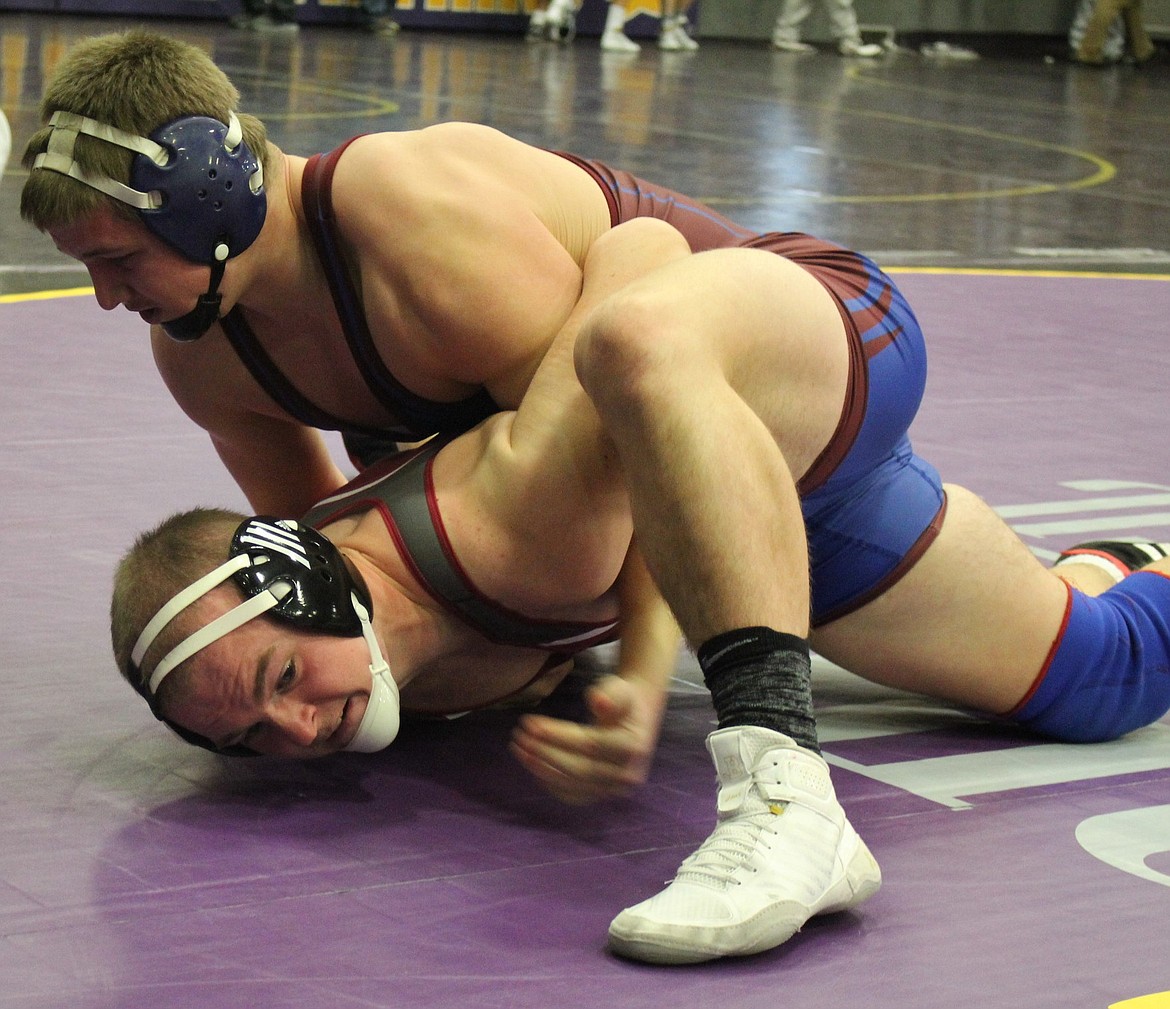 Clark Fork Mountain Cat Trey Green pins his opponent at the Jug Beck Rocky Mountain Classic at Sentinel High School in Missoula last weekend. Green placed seventh in the 182-pound class. (Kathleen Woodford/Mineral Independent)