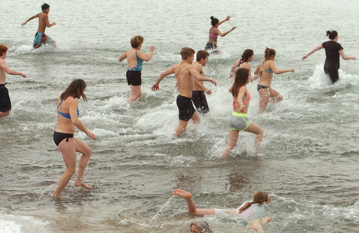 Body temperatures went down quickly for participants in the 2019 Polar Plunge into the water at Riverside Park on New Year&#146;s Day. It was not all &#147;that&#148; cold with the temperature around the freezing mark. (Joe Sova/Lake County Leader)