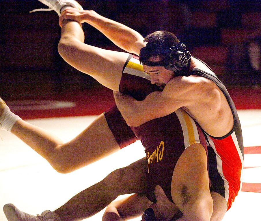 Rodney Harwood/Columbia Basin Herald - Othello's Easton Roylance works Levi Carlos of Moses Lake in the 170-pound match of Wednesday's non-league dual between the Chiefs and Huskies. Othello won 39-33 at PJ Taggares Gym.