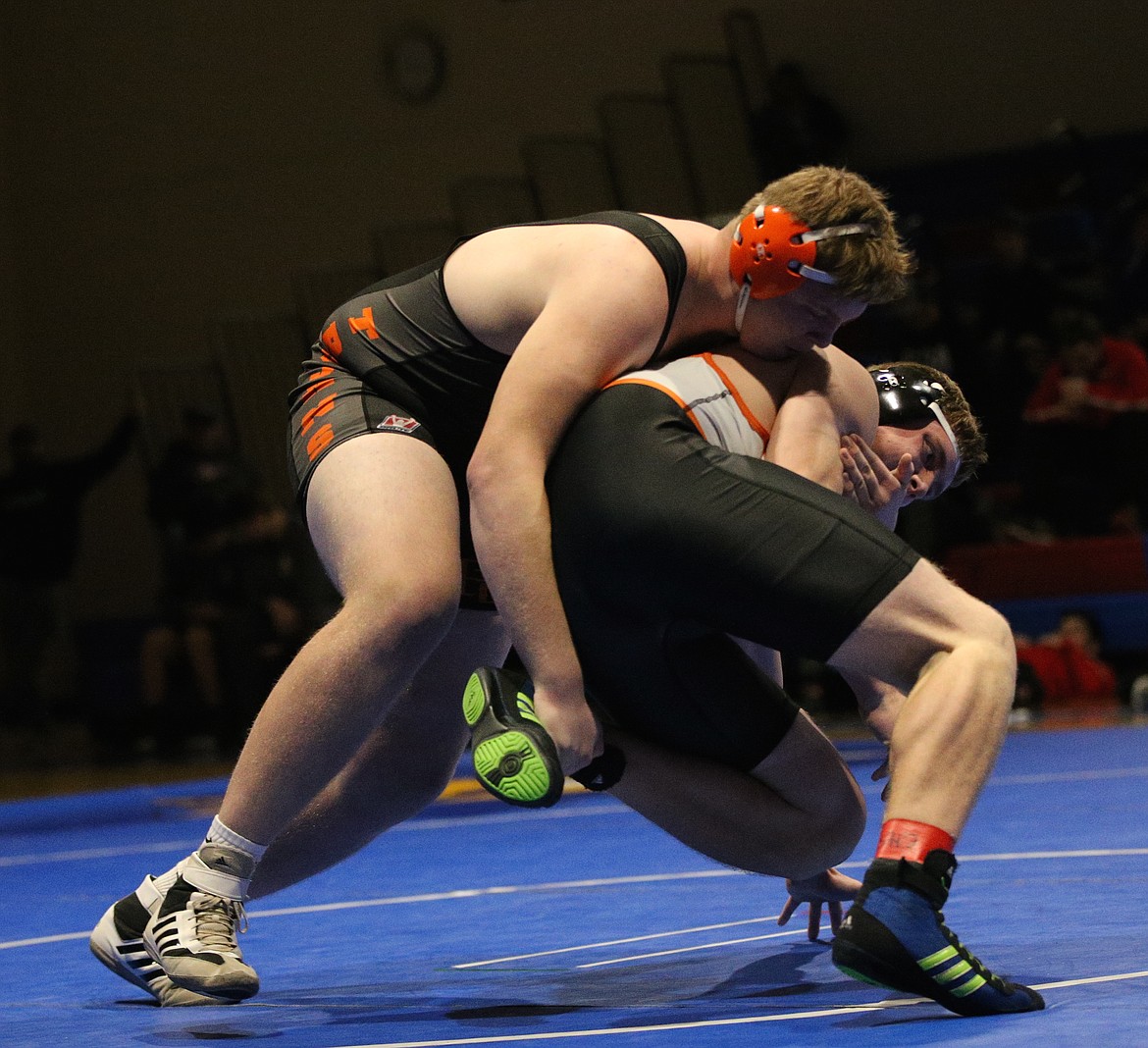 JASON ELLIOTT/Press
Terran Sharbrough of Post Falls attempts to take down Ethan Simpson of West Valley during the 285-pound championship of the North Idaho Rumble on Saturday at Coeur d&#146;Alene High. Sharbrough won by pin in 3:21.