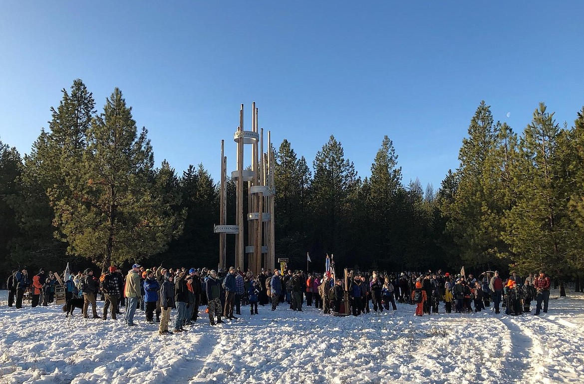 More than 400 Boy Scouts of the Inland Northwest Council gather at the Friendship Poles in Farragut State Park at the start of the Klondike Derby. (Photo by TIM WILLIAMS)