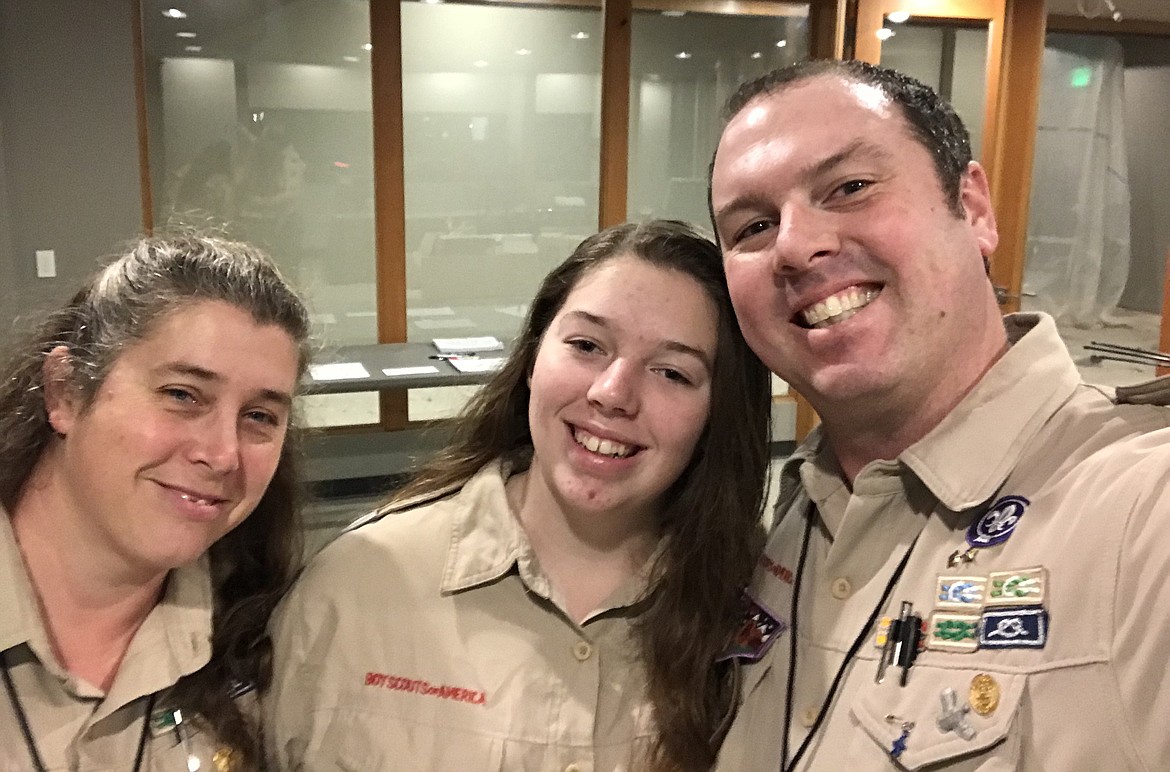 From left, mom Bobbie Jo, daughter Rachel and dad Phil Peck, of Bayview, snap a photo during a Scout recruiting day Dec. 18. Rachel, 16, will officially become a Scout on Feb. 1, when the Boys Scouts of America opens a new program for females and males under the moniker Scouts BSA. (Courtesy photo)