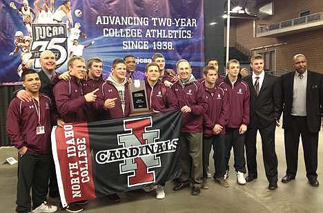 (Courtesy photo)
North Idaho College wrestlers, coaches and support crew celebrate after the Cardinals tied Labette College to earn its 14th NJCAA championship in 2013 in Des Moines, Iowa.