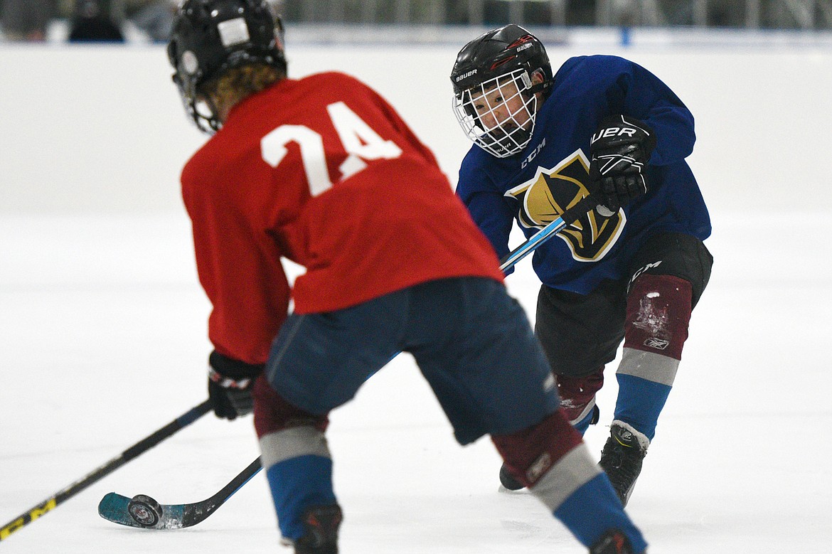 A player on the blue team takes a shot.