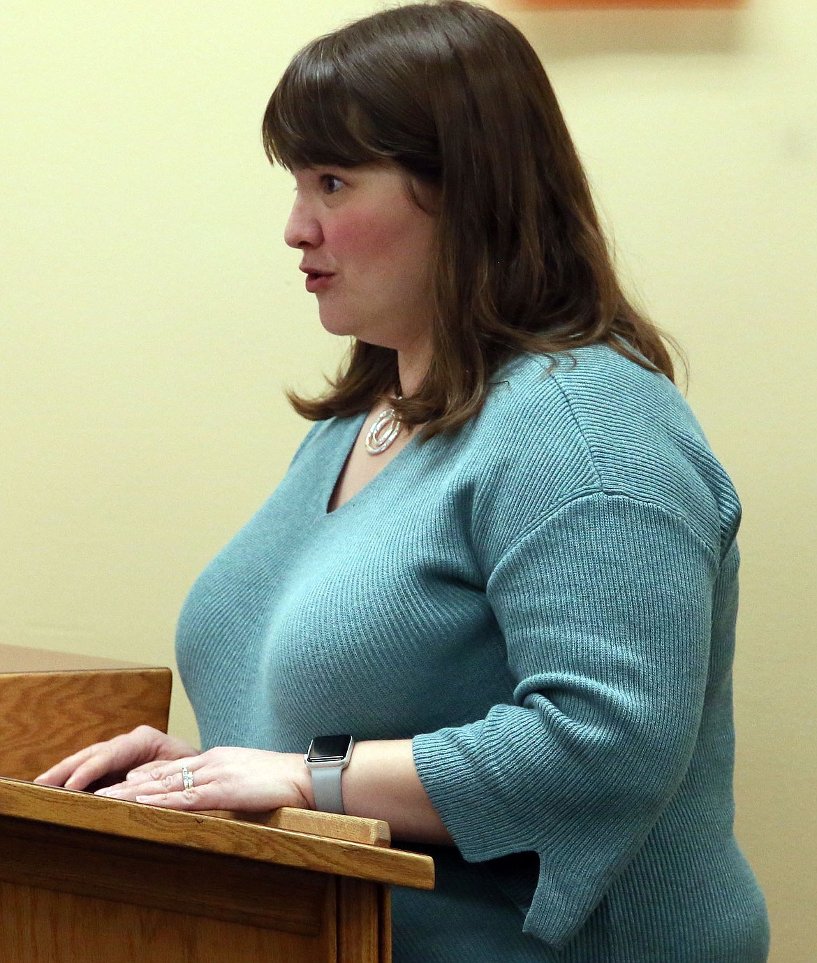 Northwest Expedition Academy counselor Megan Franklin speaks to the school board Tuesday night about the needs of NExA&#146;s 318 students. (JUDD WILSON/Press)