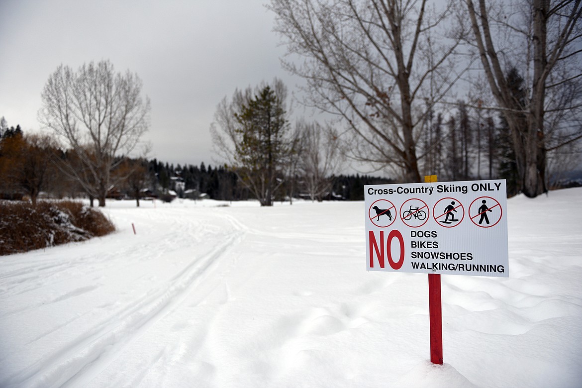 Cross-country ski tracks lead from the pro shop to three possible loop trails at Meadow Lake Golf Course in Columbia Falls on Tuesday. (Casey Kreider/Daily Inter Lake)