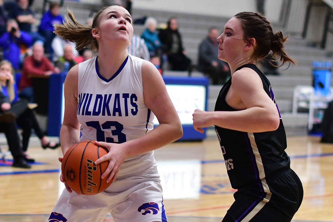 Grace Gedlaman takes the ball inside against Polson Tuesday. (Jeremy Weber photo)