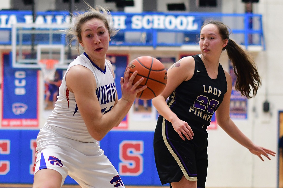 Josie Windauer comes down with a rebound in the second quarter against Polson Tuesday. (Jeremy Weber photo)