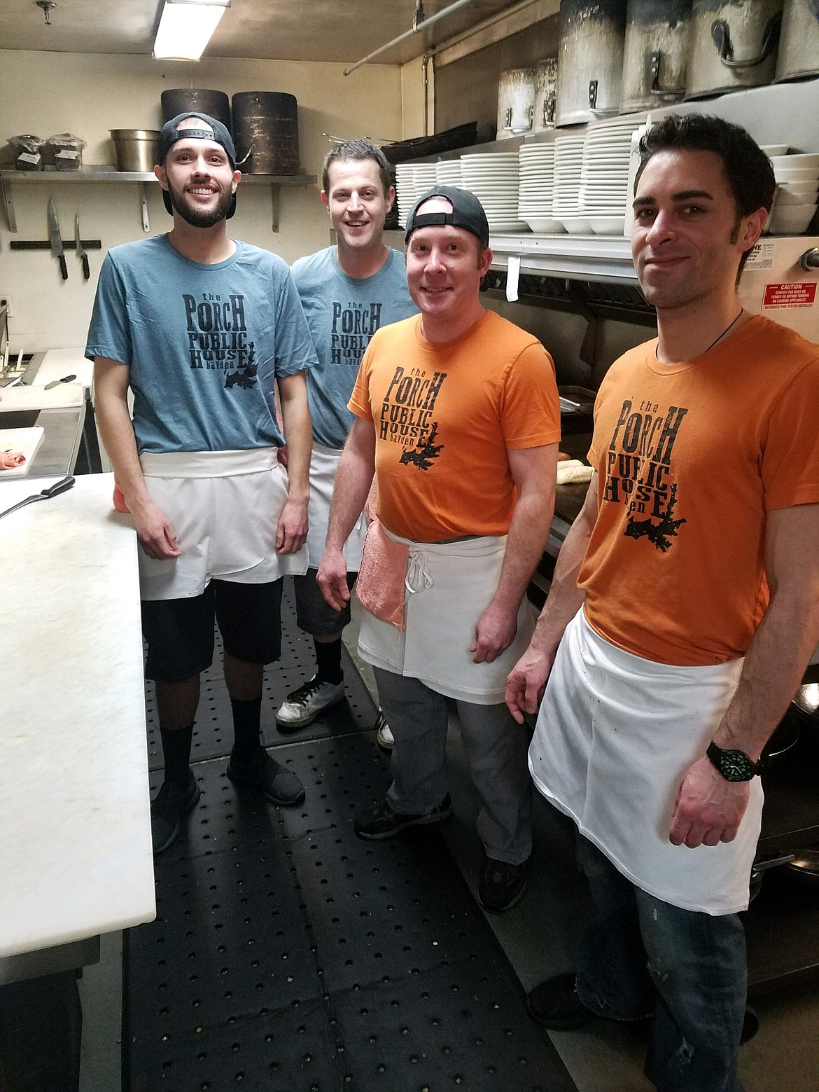 From left, Dylan Higgins, Ricky Laws, Luke Tracey and Jordan Cook smile for the camera before preparing for the dinner rush Friday. Workers like these guys have access to emergency help through CDAIDE, a nonprofit dedicated to helping the service and hospitality community. (Courtesy photo)