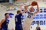 Buzzer beater lifts Cats past Corvallis, girls win in blowout