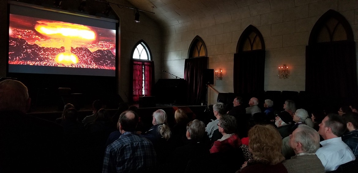 Photo by MANDI BATEMAN
The audience watches a film by the Idaho Public Television called &#147;The Color of Conscience.&#148;