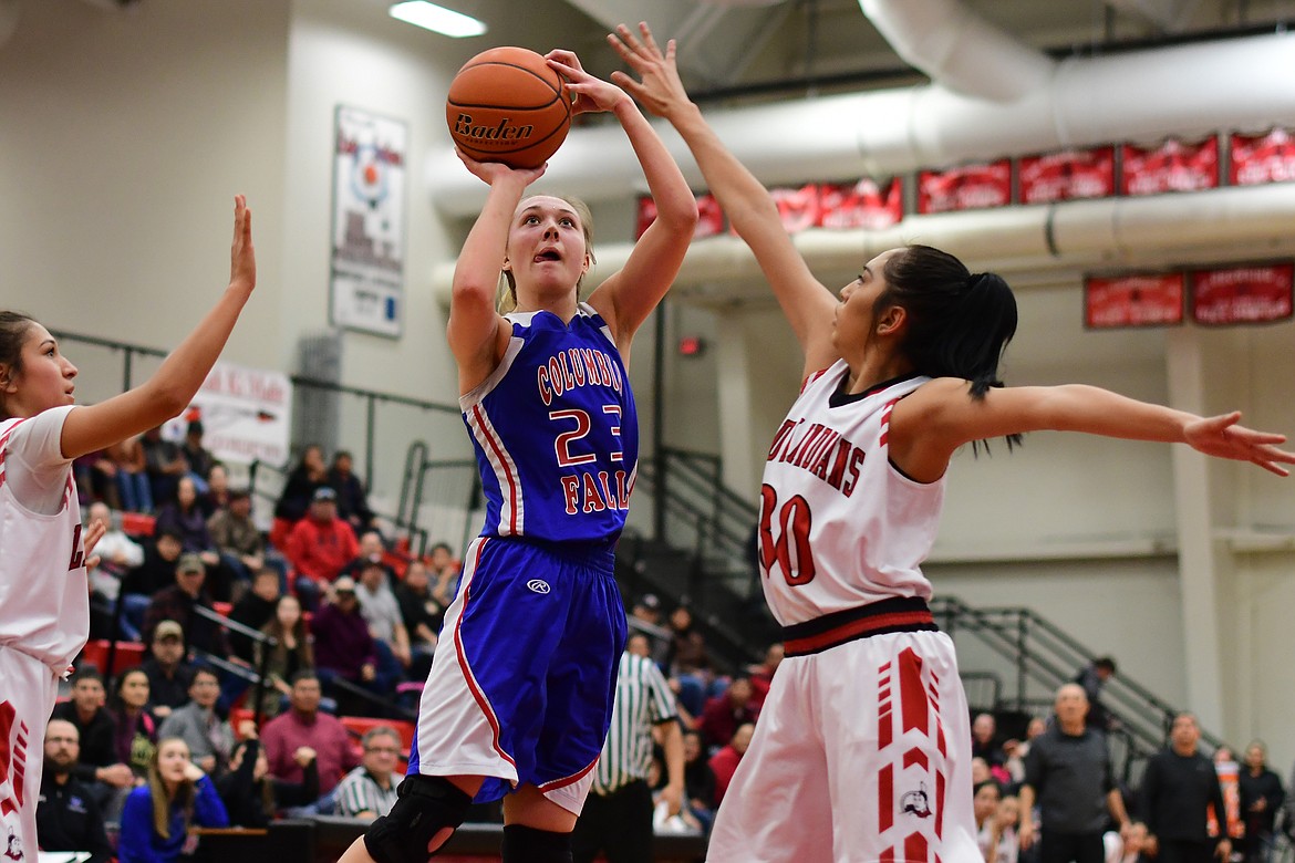 Ryley Kehr pulls up for a jumper in overtime against the Lady Indians in Browning Thursday. (Jeremy Weber photo)