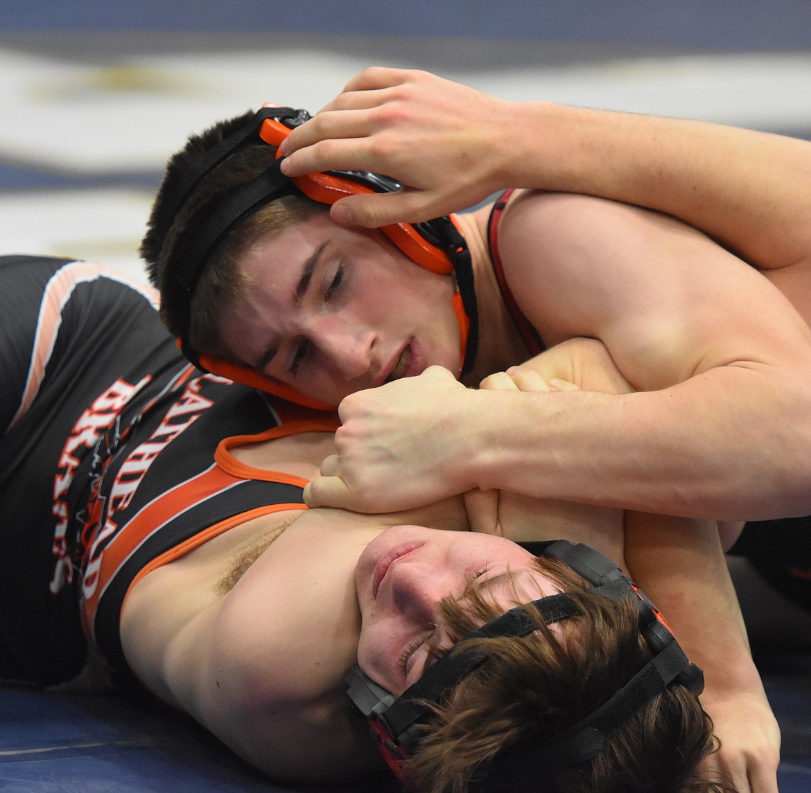 Conrad Vanderwall of the Plains/Hot Springs wrestling team won the 132-pound title at the Ted Kato Invitational held last Saturday at Thompson Falls High School. In the photo, Vanderwall is about to pin his Flathead JV opponent. His senior brother Josiah Vanderwall captured the 138-pound crown. (Joe Sova/Clark Fork Valley Press)