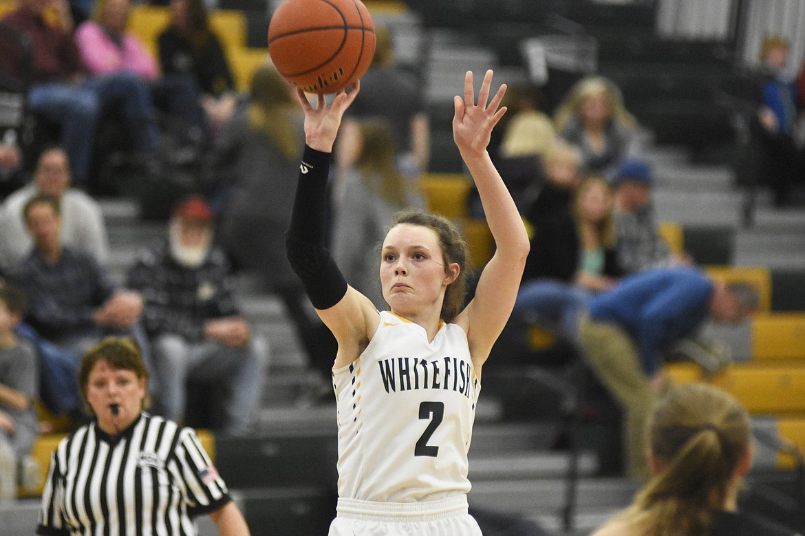 Kaiah Moore launches the jumpshot during Friday's win over Polson. (Daniel McKay/Whitefish Pilot)