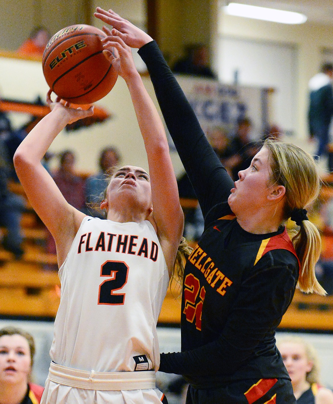 Flathead&#146;s Emily Lembke (2) looks to shoot with Missoula Hellgate&#146;s Bailee Sayler (22) defending at Flathead High School on Thursday. (Casey Kreider/Daily Inter Lake)