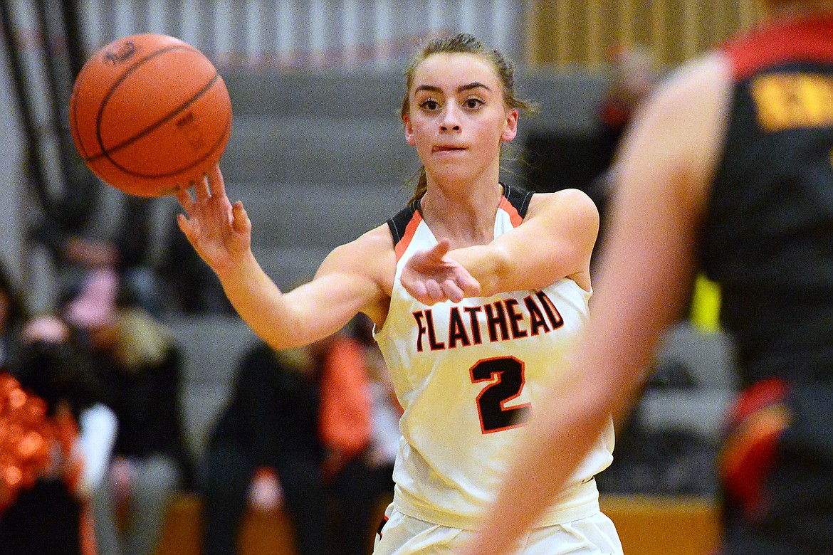 Flathead&#146;s Emily Lembke (2) looks to pass against Missoula Hellgate at Flathead High School on Thursday. (Casey Kreider/Daily Inter Lake)